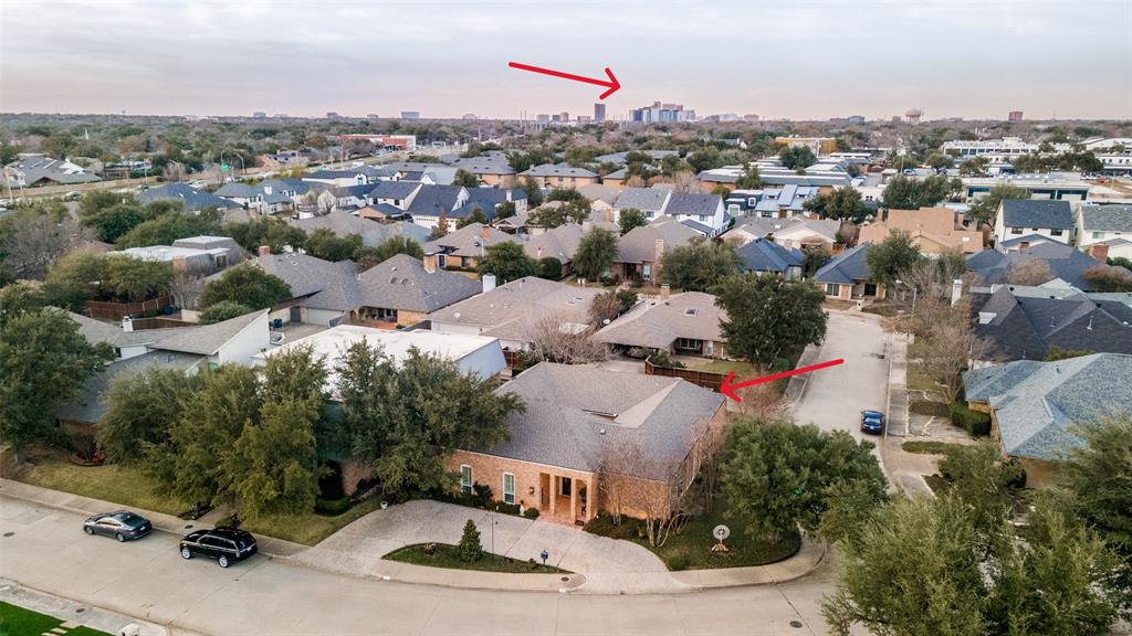 5723 Overdowns Drive Dallas, TX 75230 - Photo 34 of 36 an aerial view of a house with a yard and lake view in back
