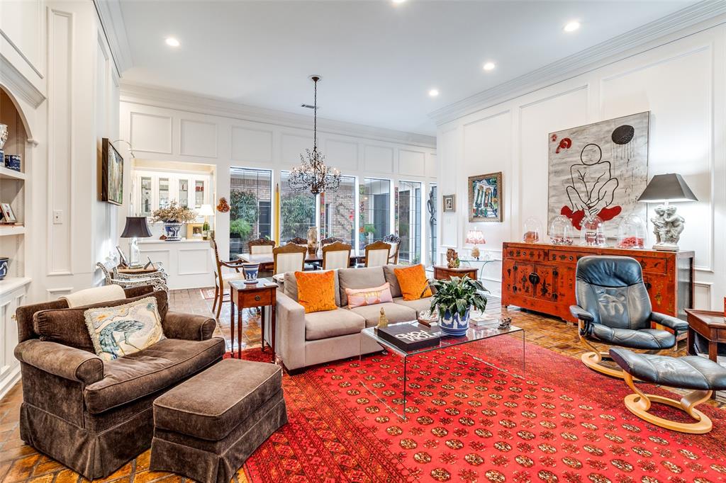 5723 Overdowns Drive Dallas, TX 75230 - Photo 7 of 36 a living room with furniture kitchen view and a large window