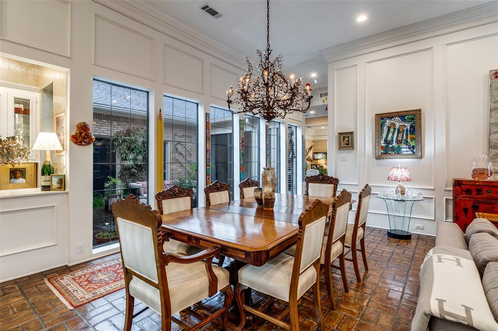 5723 Overdowns Drive Dallas, TX 75230 - Photo 10 of 36 a view of a dining room with furniture window and wooden floor