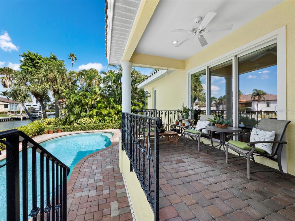 573 Spinnaker Lane Longboat Key, FL 34228 - Photo 30 of 43 a outdoor space with chairs