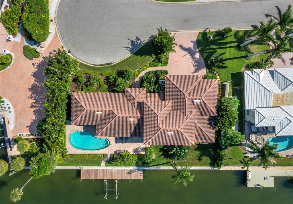 573 Spinnaker Lane Longboat Key, FL 34228 - Photo 42 of 43 an aerial view of house with yard swimming pool and outdoor seating