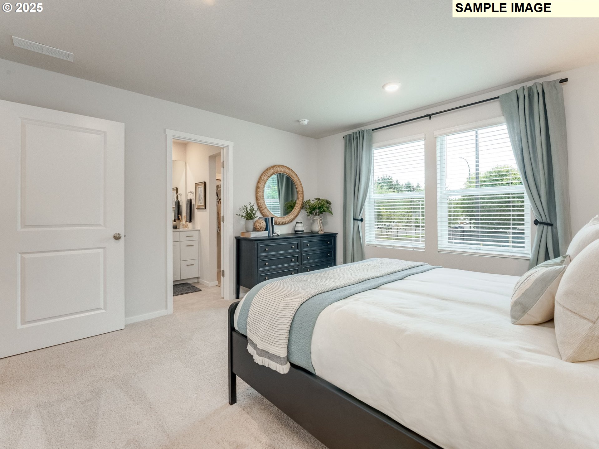 1203 Southeast 194th Place Camas, WA 98607 - Photo 19 of 24 a bedroom with a bed and a dresser