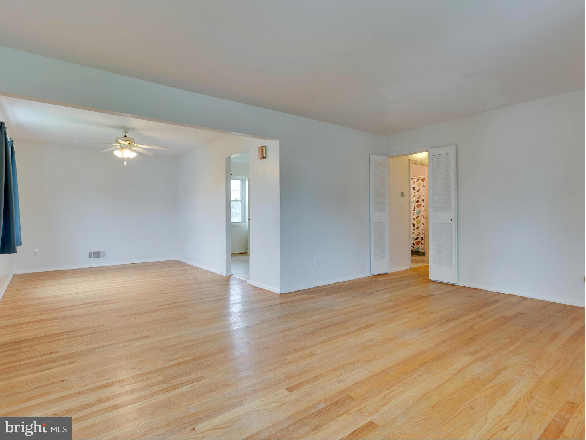 9007 Meadow Heights Road Randallstown, MD 21133 - Photo 2 of 28 Living Room / Dining Room w/Hardwood Floors