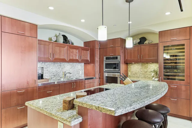a view of a potted plant with wooden fence