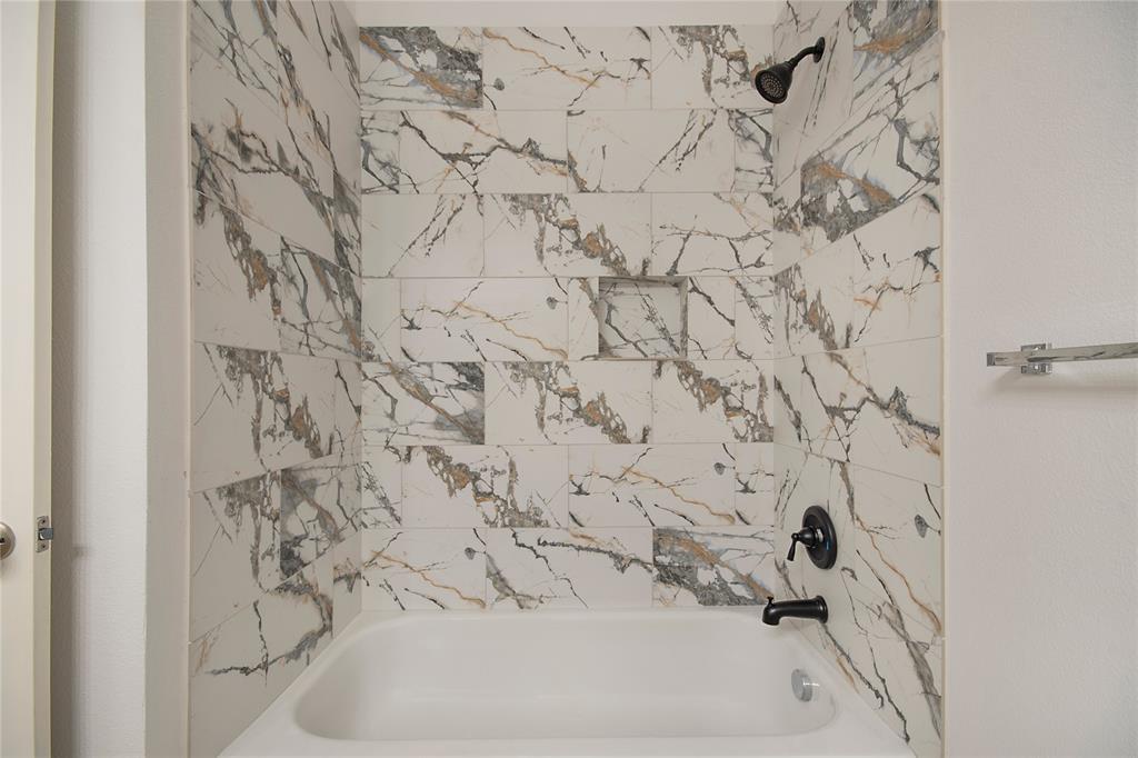 549 Hickory Lane Fate, TX 75087 - Photo 31 of 38 Bathroom with shower / bath combination