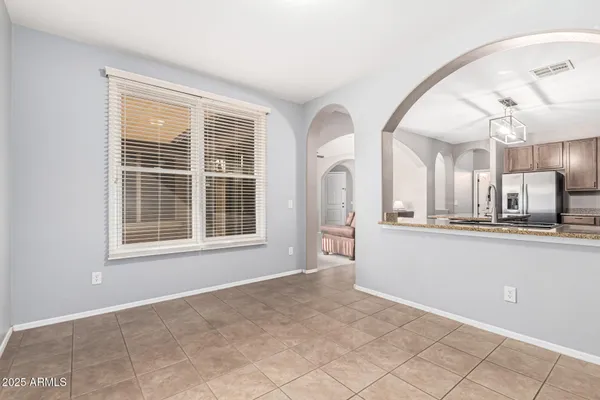 a view of a kitchen with a sink and a window