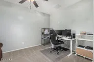 a view of a workspace with furniture