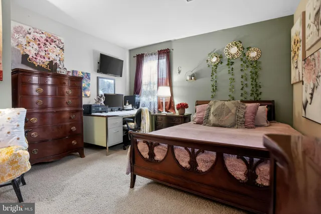 a kitchen with a sink cabinets and window