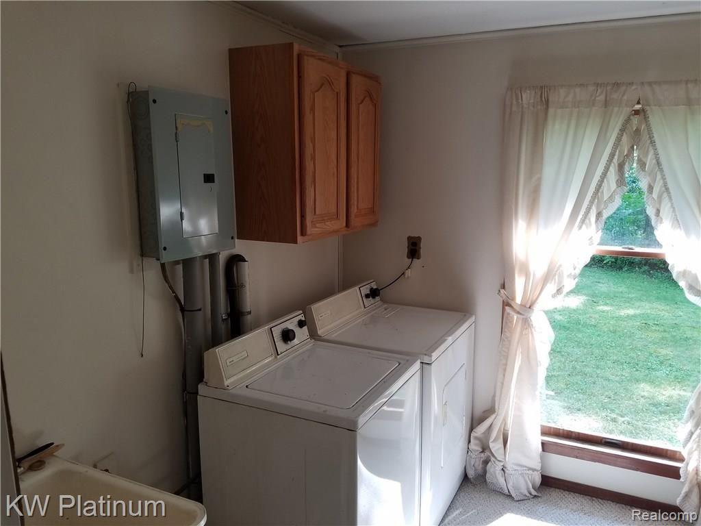 6244 Rynn Road North Street, MI 48049 - Photo 19 of 22 LARGE LAUNDRY ROOM