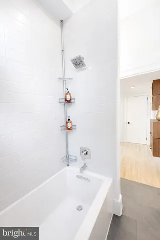 a view of a livingroom with wooden floor