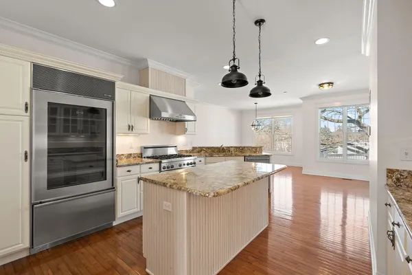a view of a kitchen from the hallway
