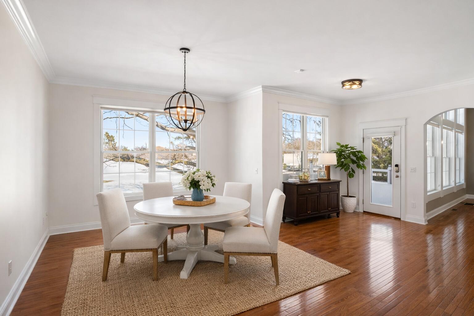 1240 Ryder Road Chesterton, IN 46304 - Photo 22 of 65 a view of a dining room with furniture window and wooden floor