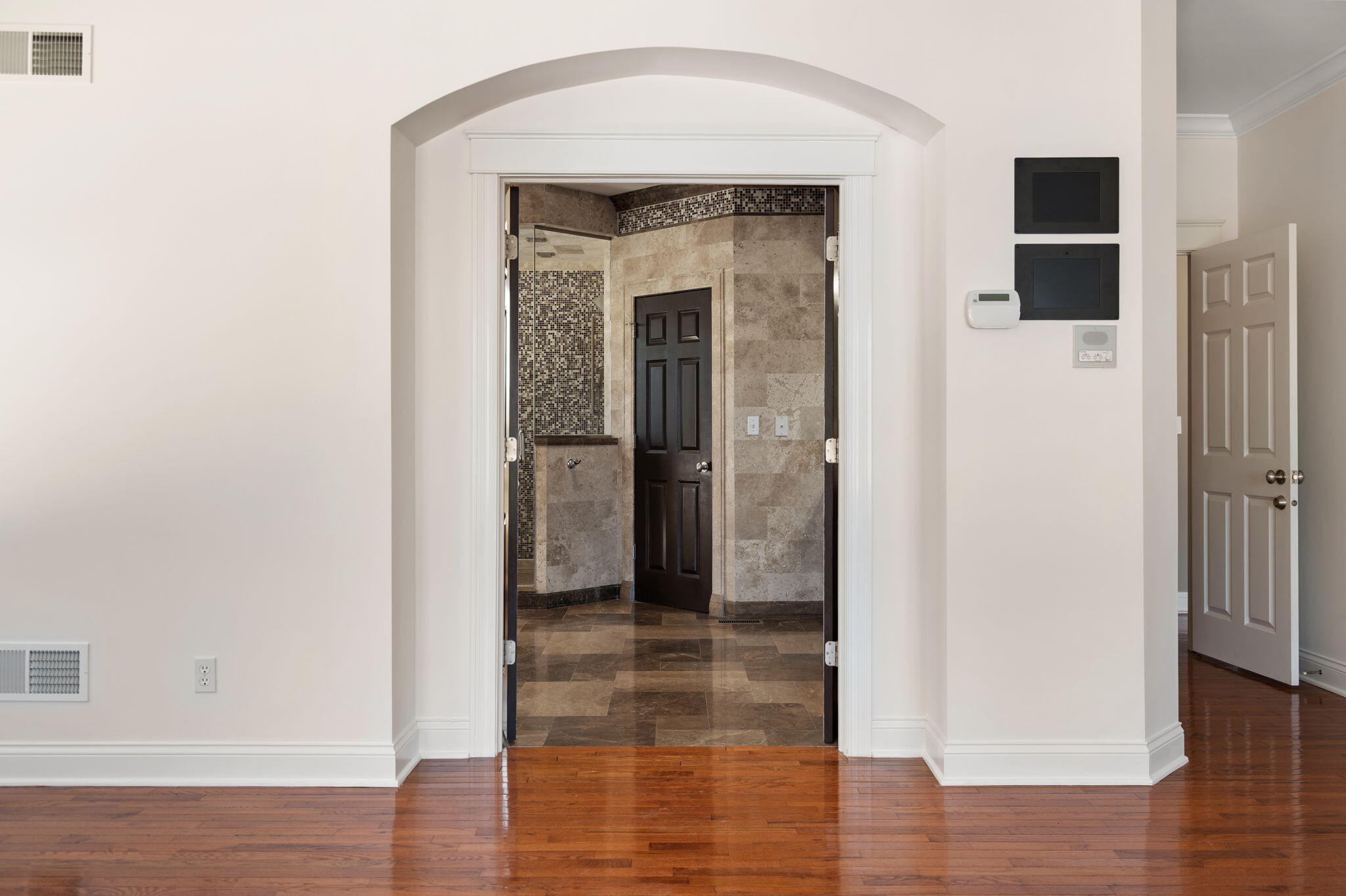 1240 Ryder Road Chesterton, IN 46304 - Photo 31 of 73 a view of a hallway with wooden floor and entryway