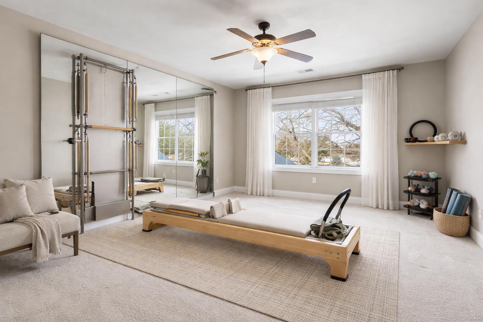 1240 Ryder Road Chesterton, IN 46304 - Photo 46 of 73 a living room with furniture gym equipment and a large window