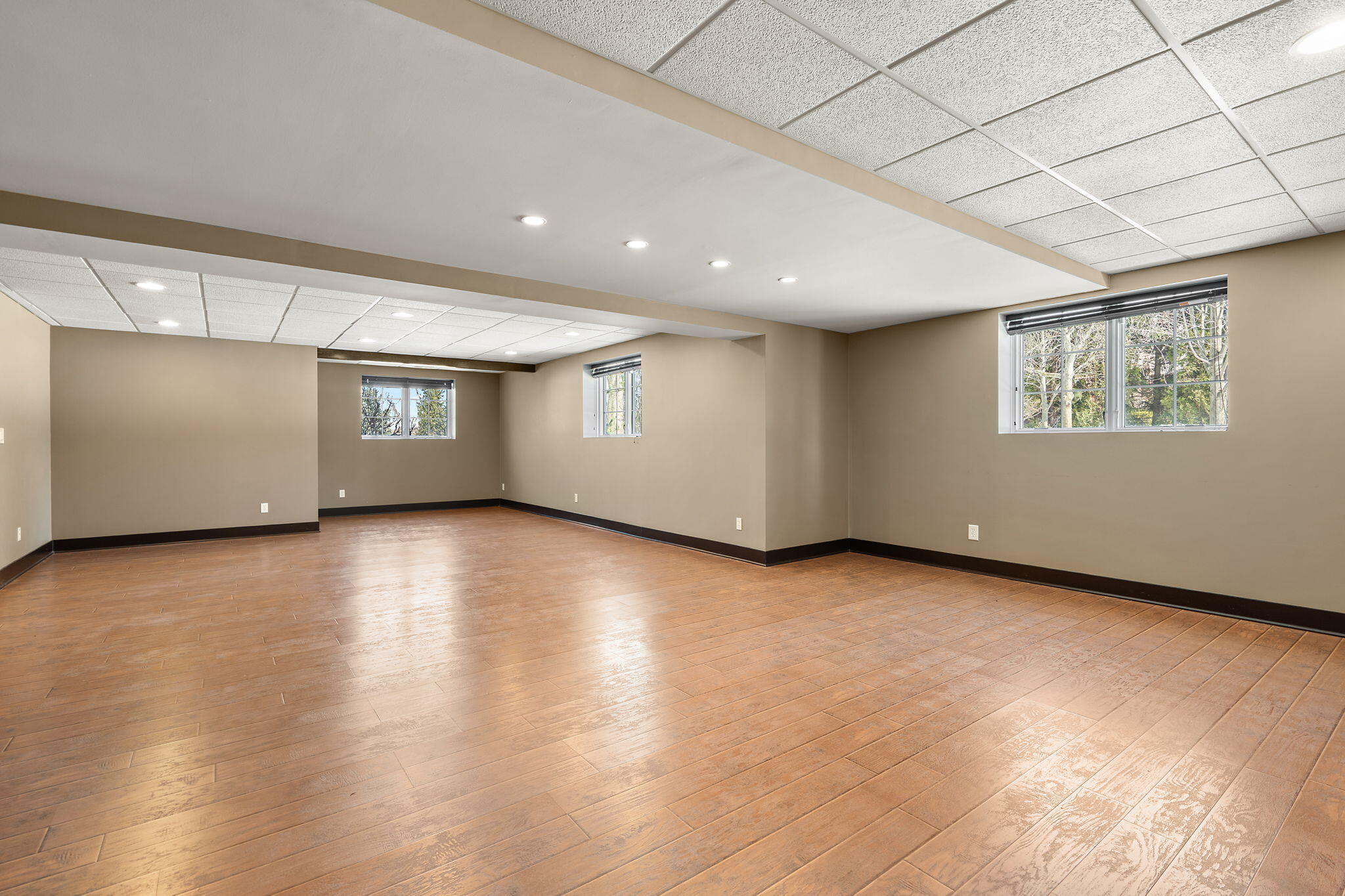 1240 Ryder Road Chesterton, IN 46304 - Photo 51 of 65 an empty room with wooden floor and windows