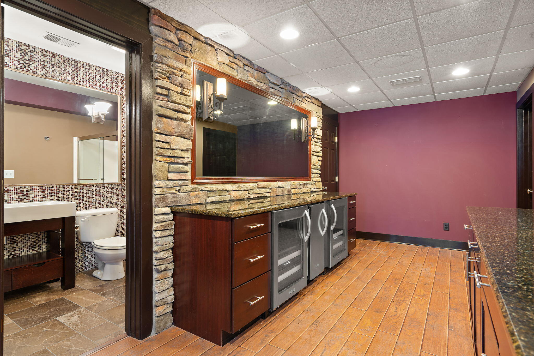 1240 Ryder Road Chesterton, IN 46304 - Photo 54 of 73 a kitchen with stainless steel appliances granite countertop a stove and a sink