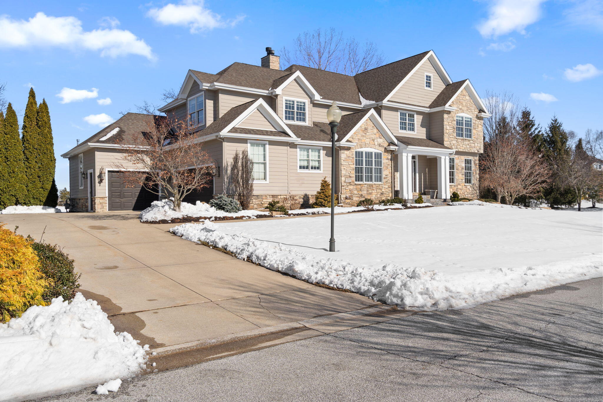 1240 Ryder Road Chesterton, IN 46304 - Photo 70 of 73 a view of a white house with a small yard and wooden fence