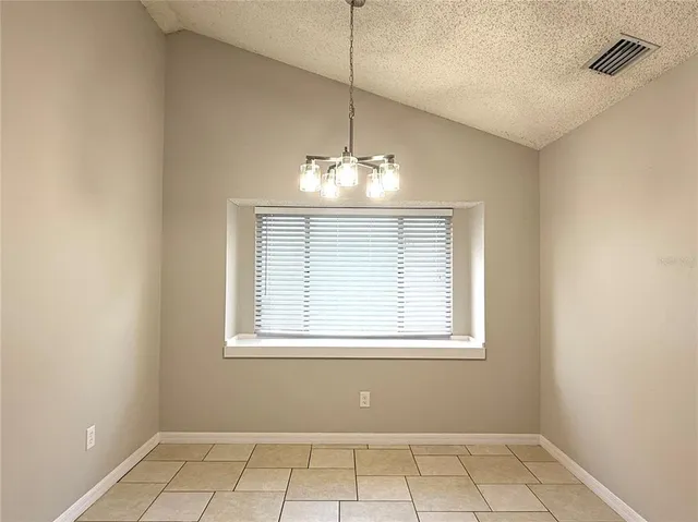 a view of a room with windows