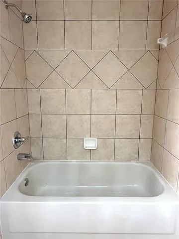 a bathroom with a bathtub