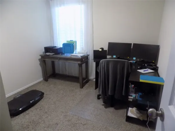 a room with furniture and a window