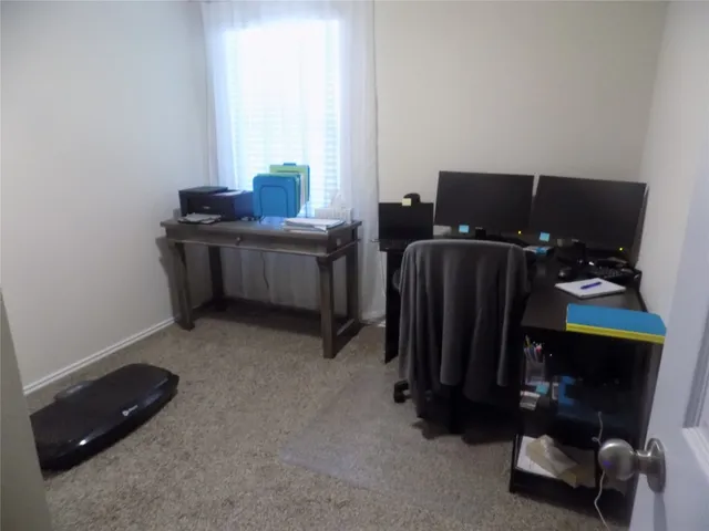 a room with furniture and a window