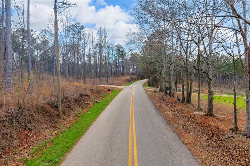1660 Watkins Farm Road Nicholson, GA 30565 - Photo 18 of 55 a view of a lake with a large trees
