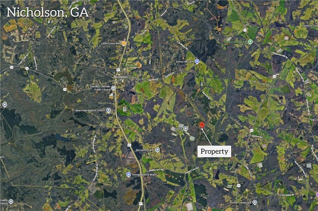 1660 Watkins Farm Road Nicholson, GA 30565 - Photo 4 of 55 a sign that is sitting in a tree