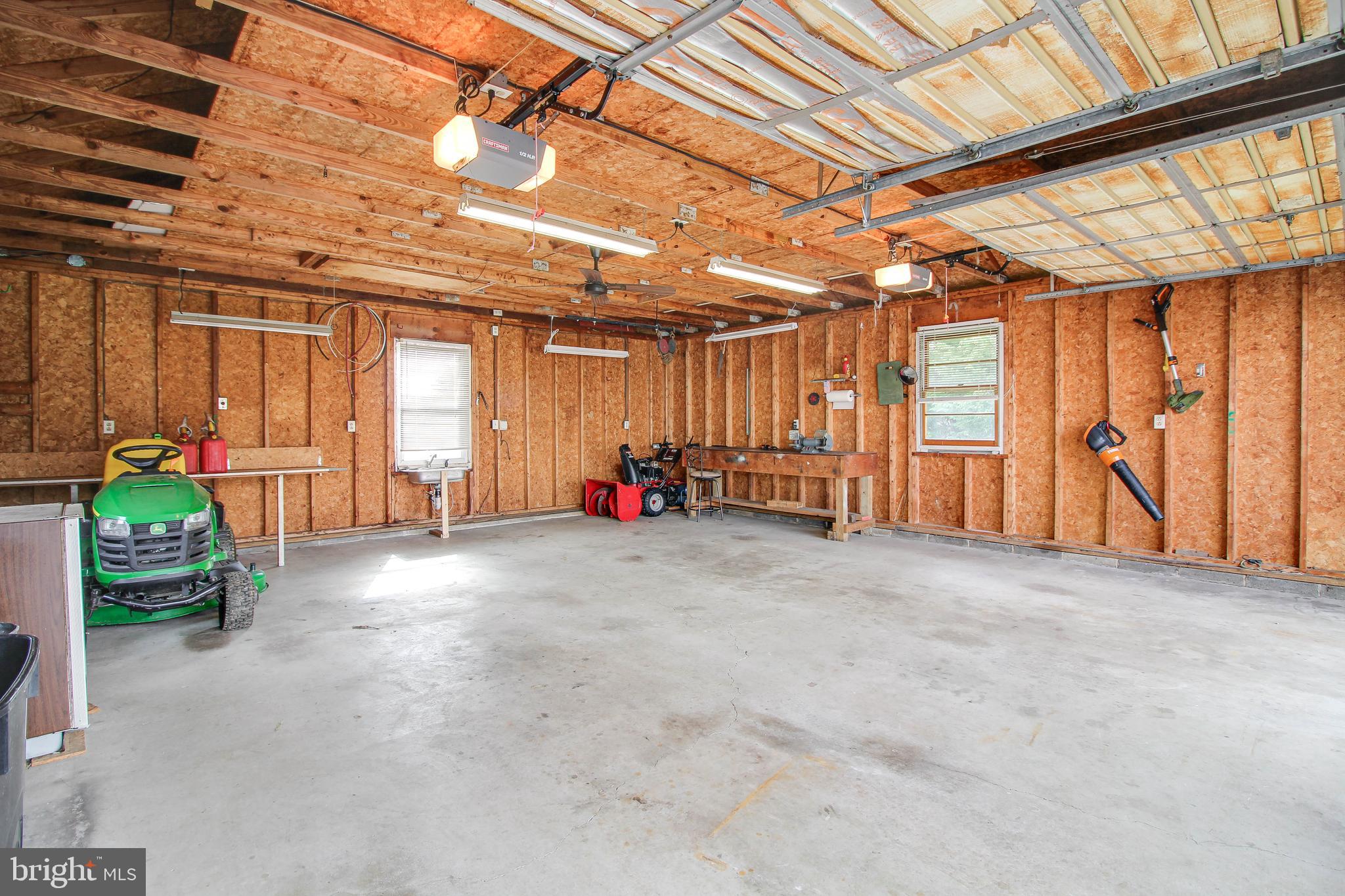 15753 Dover Road Upperco, MD 21155 - Photo 53 of 61 Convenient workbench, & sink in back of garage