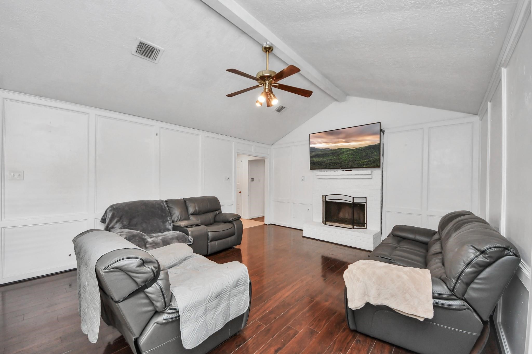 1415 Parry-Sound Pasadena, TX 77504 - Photo 6 of 34 a living room with furniture fireplace and flat screen tv