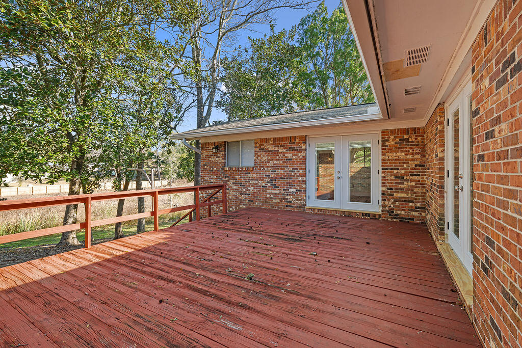 1623 18th Street Niceville, FL 32578 - Photo 30 of 41 a view of house with deck and wooden floor
