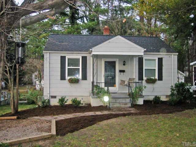 609 Glascock Street Raleigh, NC 27604 - Photo 1 of 1 a front view of a house with garden