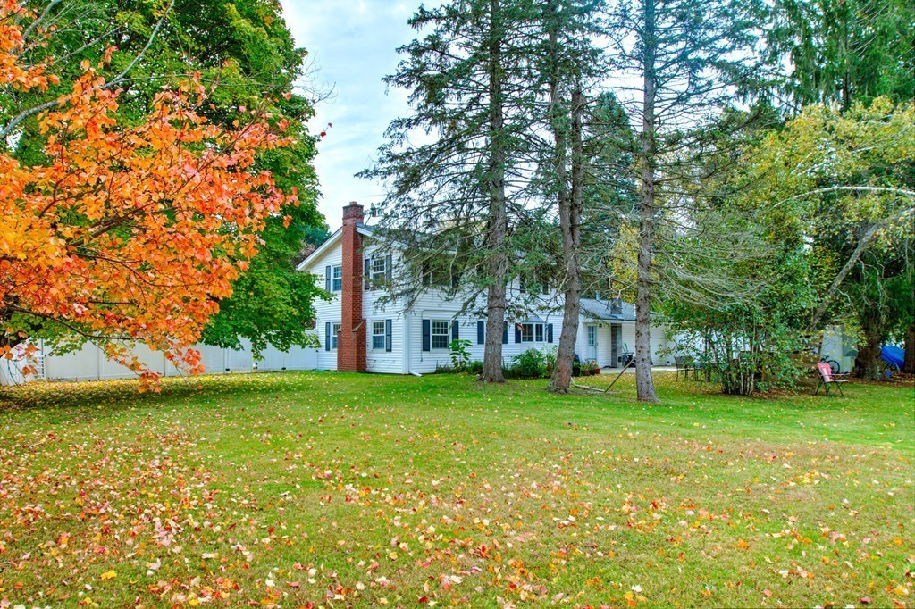 143 Turnpike Road Chelmsford, MA 01824 - Photo 30 of 30 a view of a house with a big yard next to a big yard