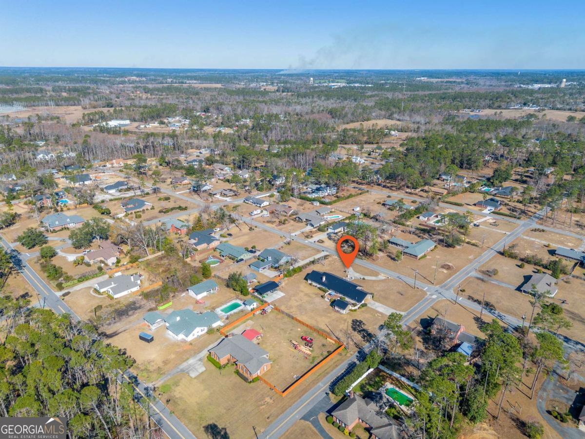 403 Rose Lane Douglas, GA 31533 - Photo 12 of 42 an aerial view of multiple house