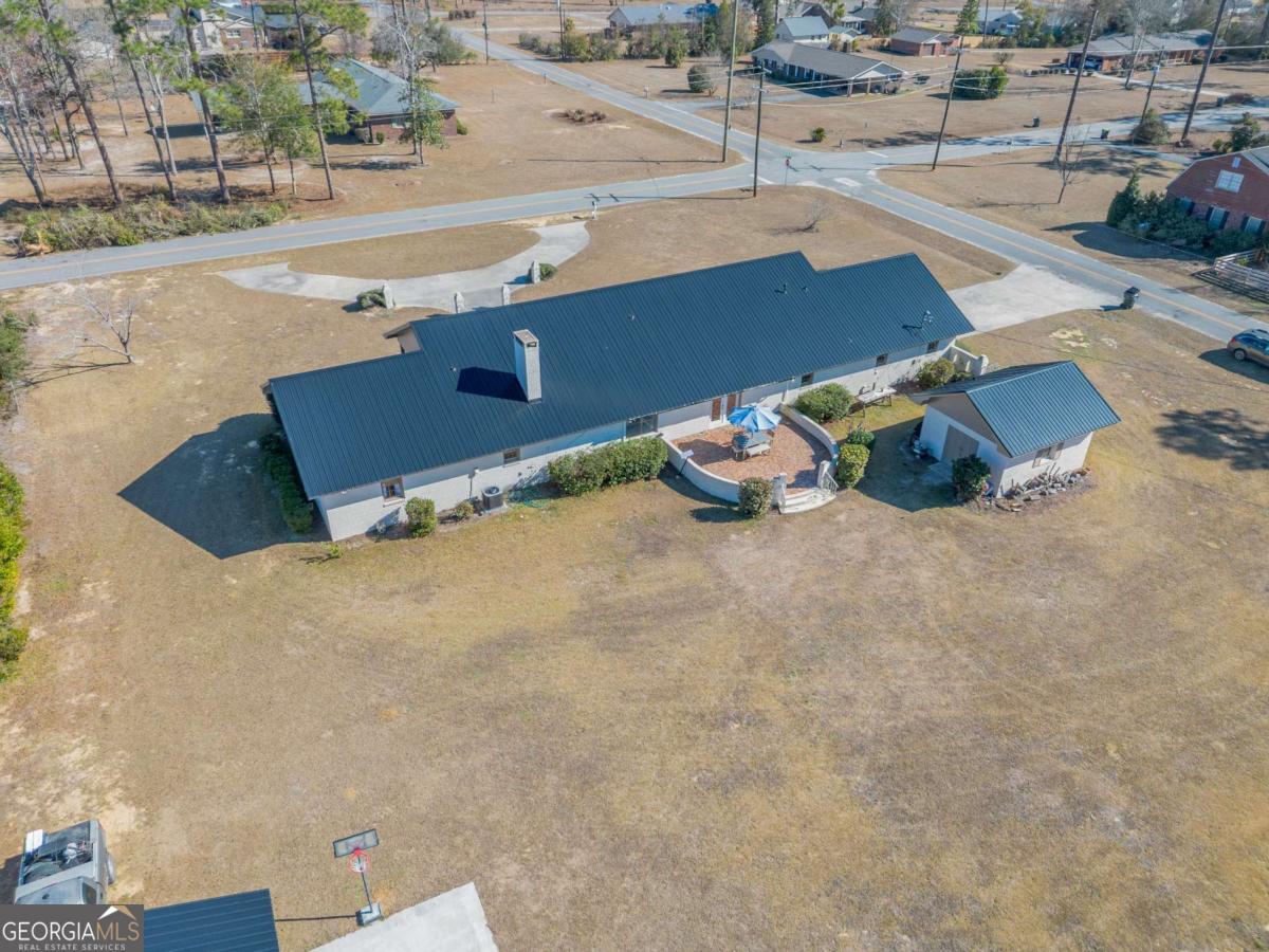 403 Rose Lane Douglas, GA 31533 - Photo 14 of 42 an aerial view of a house with a yard