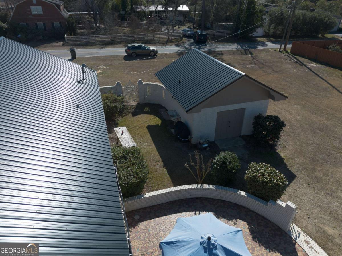 403 Rose Lane Douglas, GA 31533 - Photo 16 of 42 a aerial view of a house with a yard