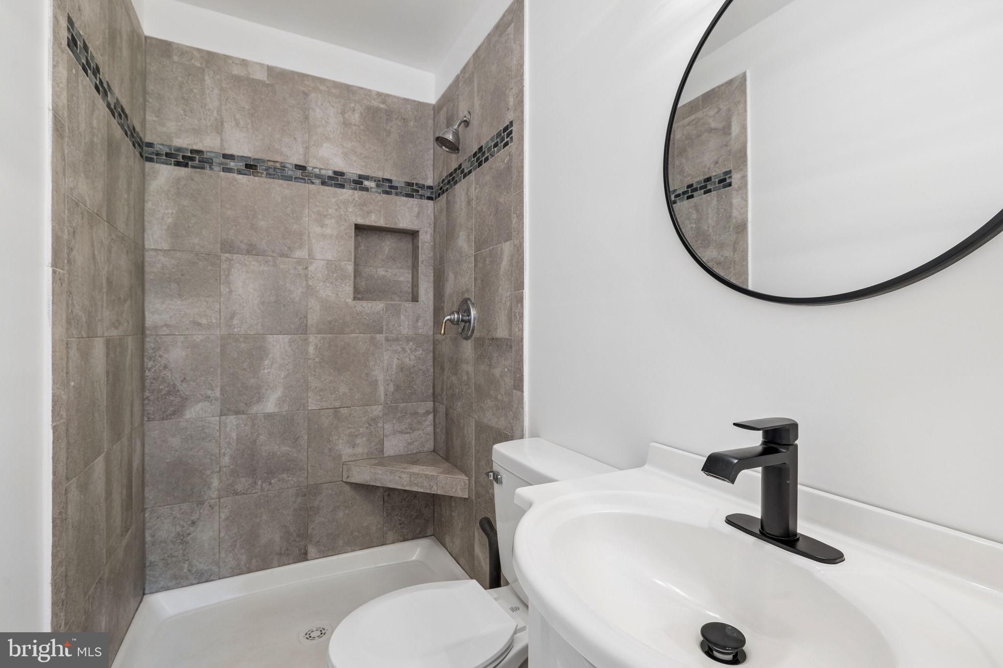12237 Randle Lane Culpeper, VA 22701 - Photo 14 of 31 a bathroom with a sink toilet and shower