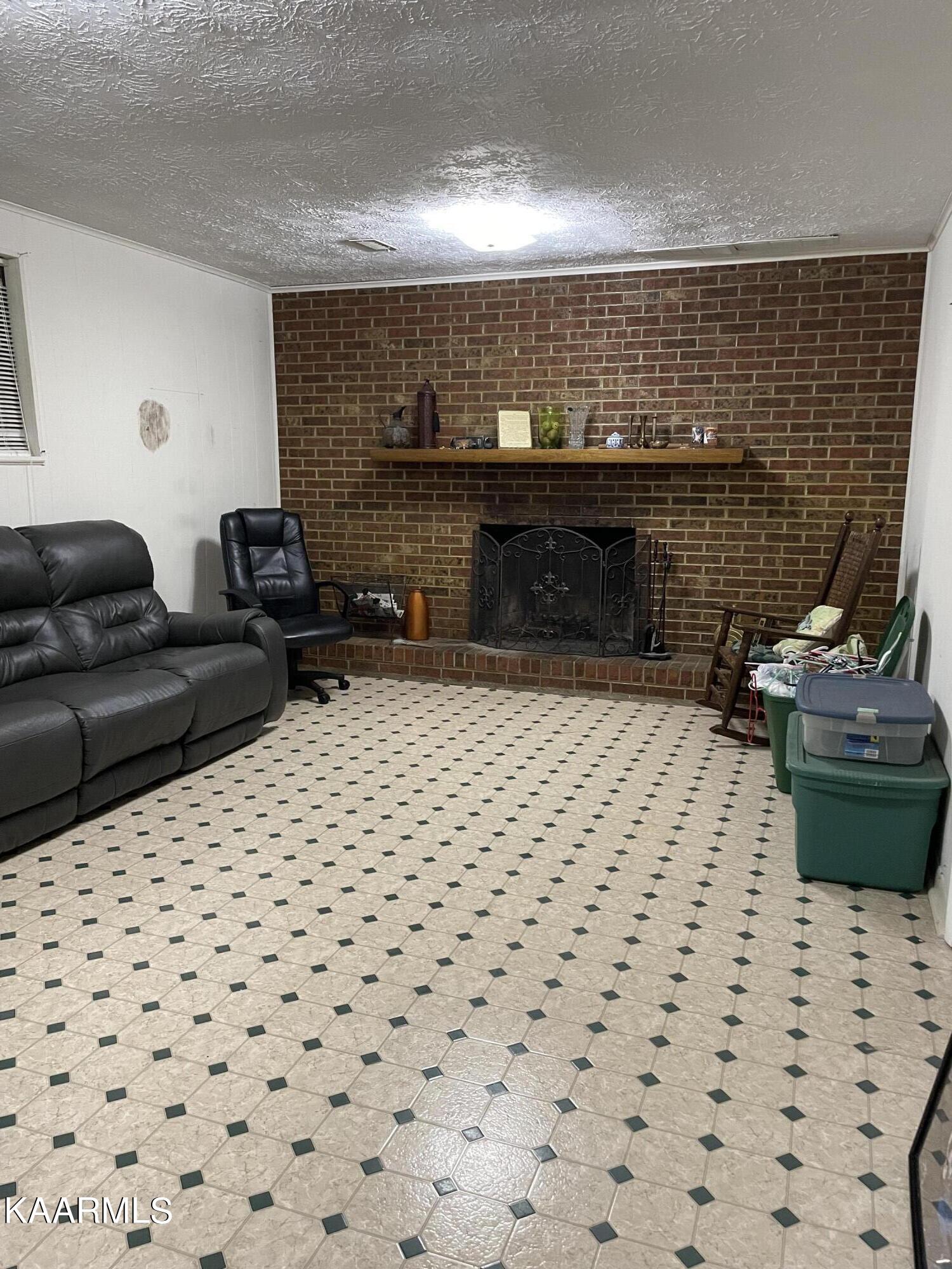 9904 Stagbush Road Powell, TN 37849 - Photo 15 of 21 Downstair den