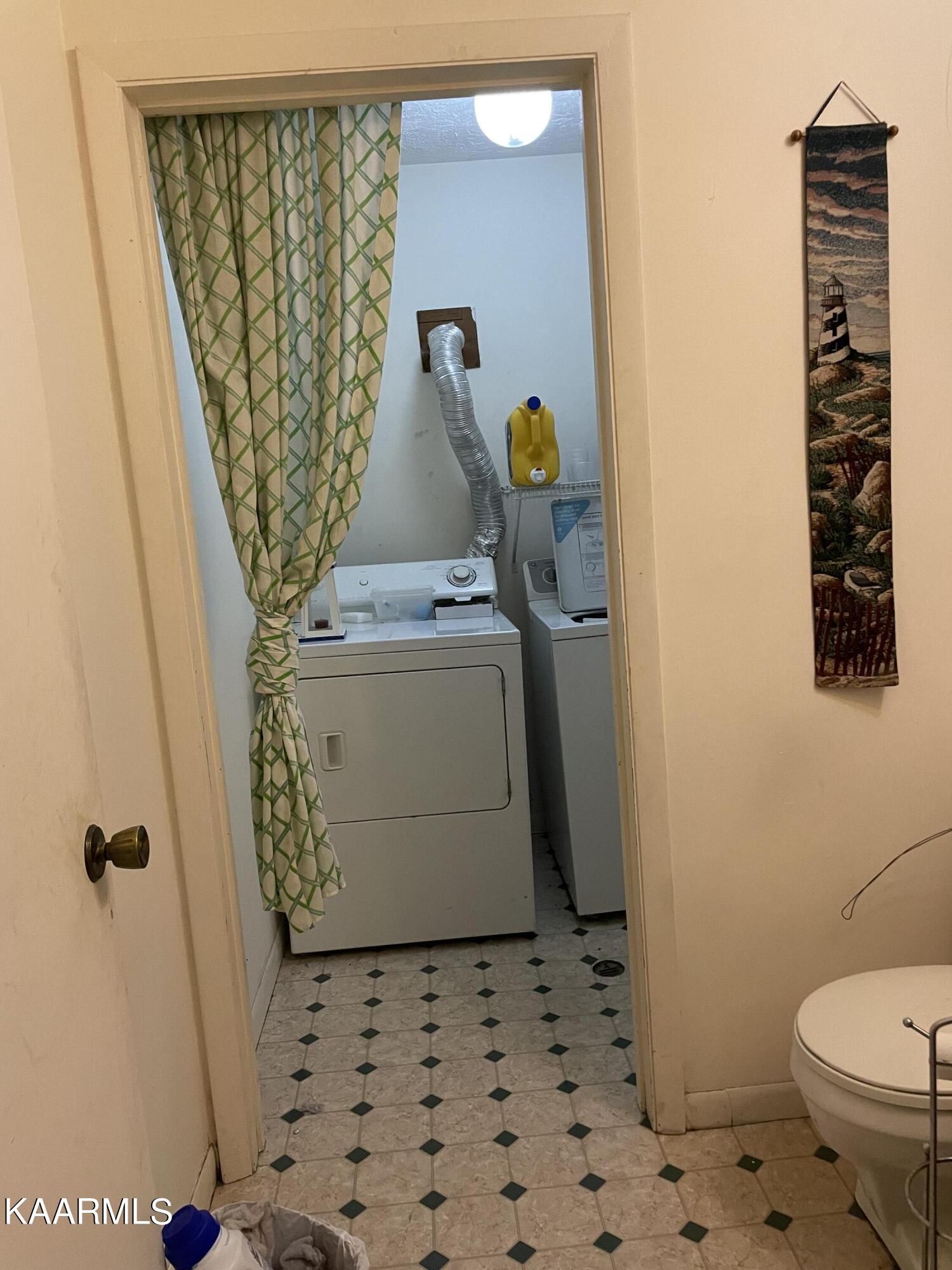 9904 Stagbush Road Powell, TN 37849 - Photo 16 of 21 downstair 1/2 bath and laundry