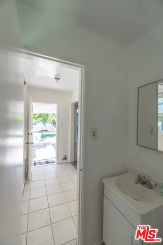 a bathroom with a sink and a vanity