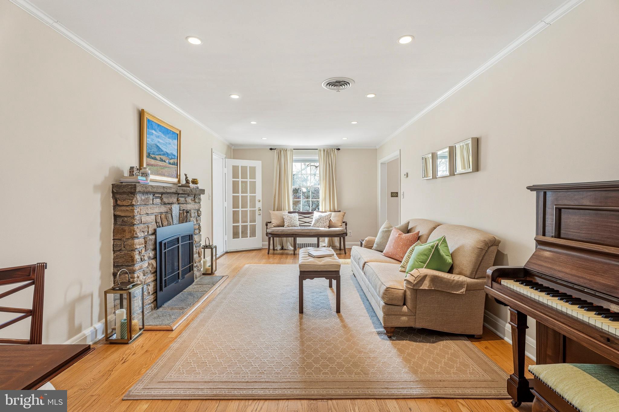 318 Alabama Road Towson, MD 21204 - Photo 12 of 72 a living room with furniture and a fireplace
