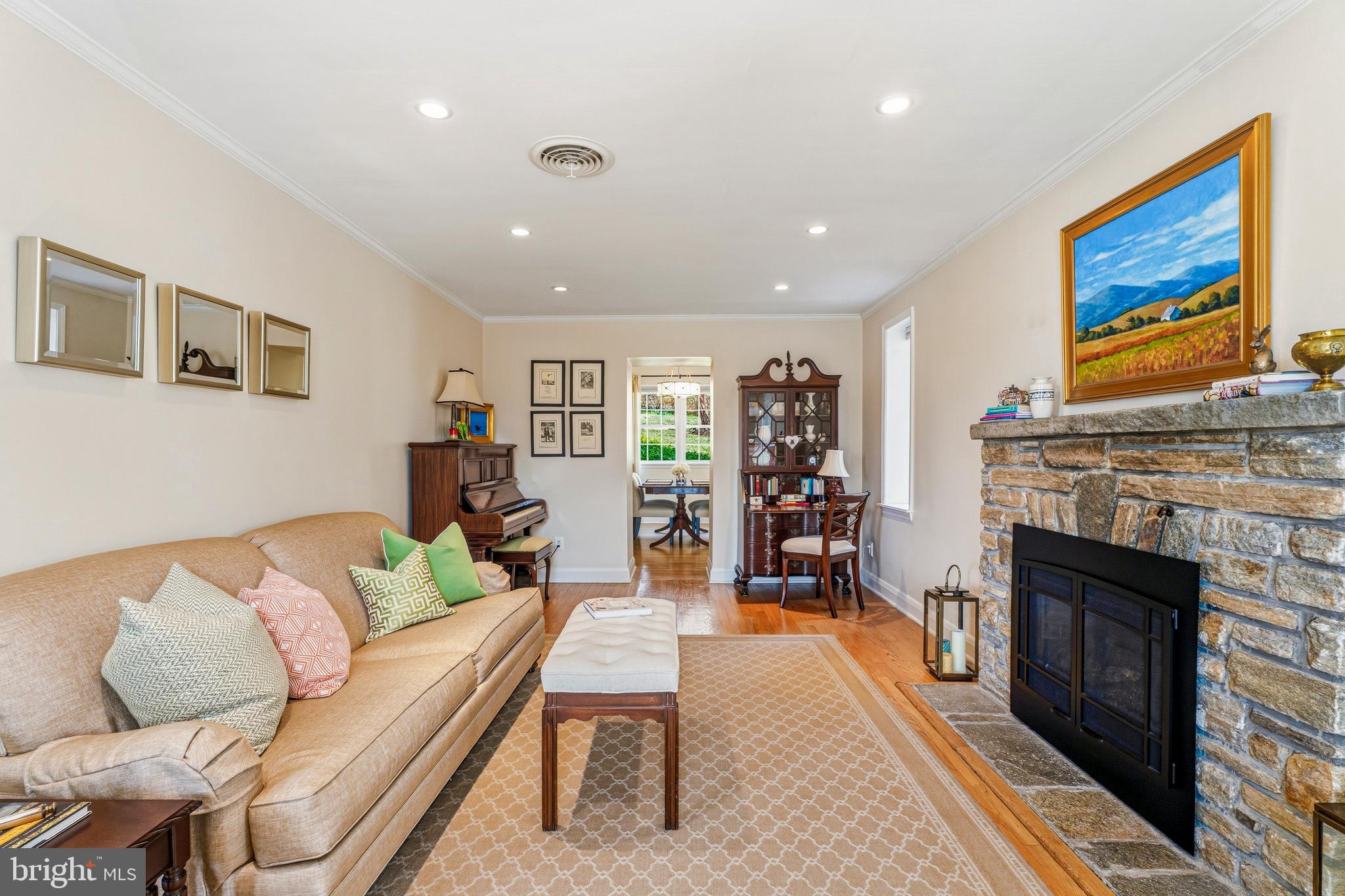 318 Alabama Road Towson, MD 21204 - Photo 13 of 72 a living room with furniture and a fireplace
