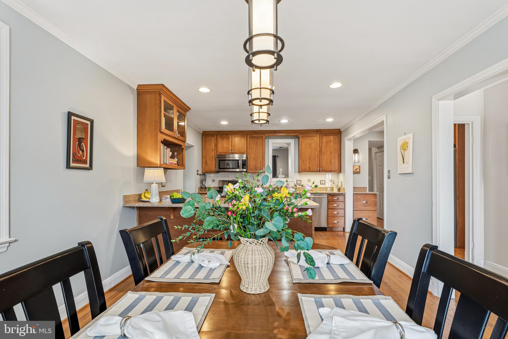 318 Alabama Road Towson, MD 21204 - Photo 17 of 72 a view of a dining room with furniture window and wooden floor