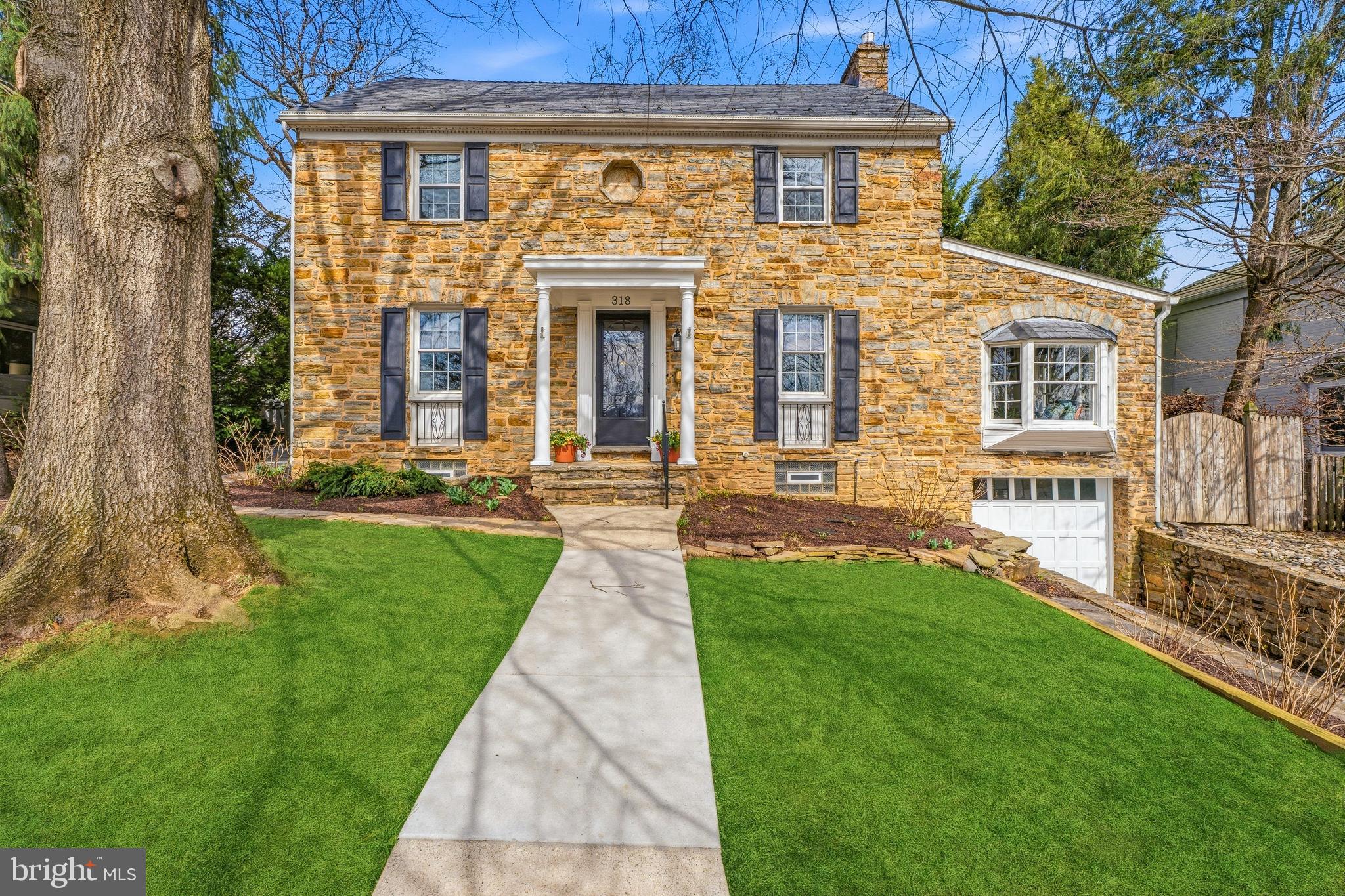 318 Alabama Road Towson, MD 21204 - Photo 2 of 72 a front view of a house with a yard