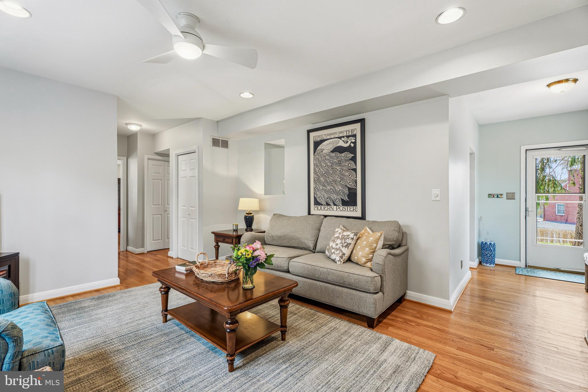 318 Alabama Road Towson, MD 21204 - Photo 25 of 72 a living room with furniture and a wooden floor