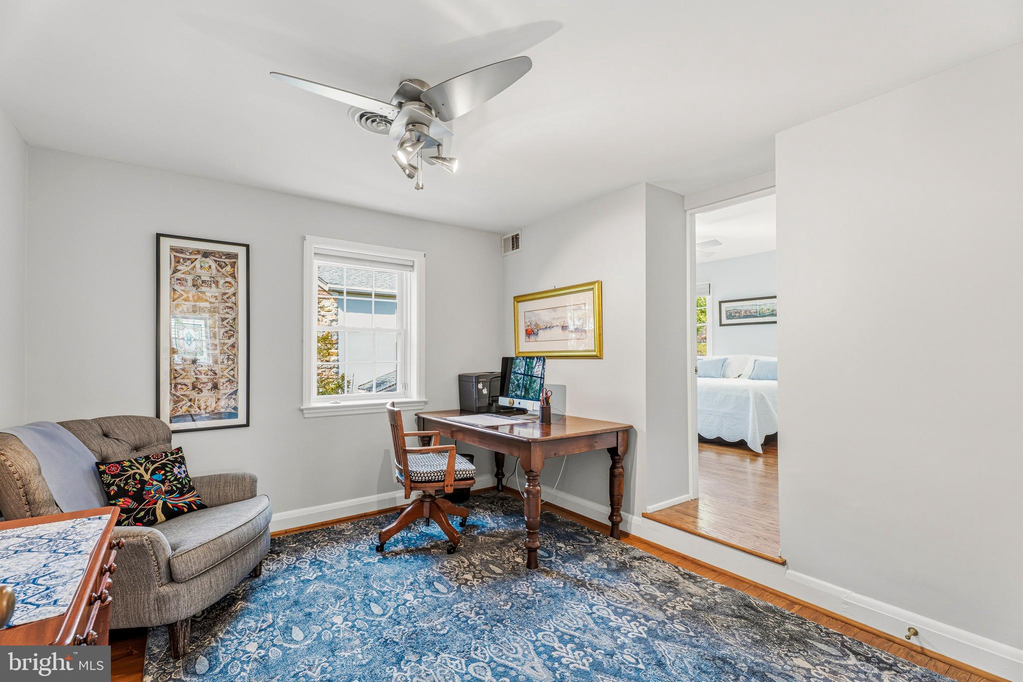 318 Alabama Road Towson, MD 21204 - Photo 34 of 72 a view of a livingroom with workspace and a window