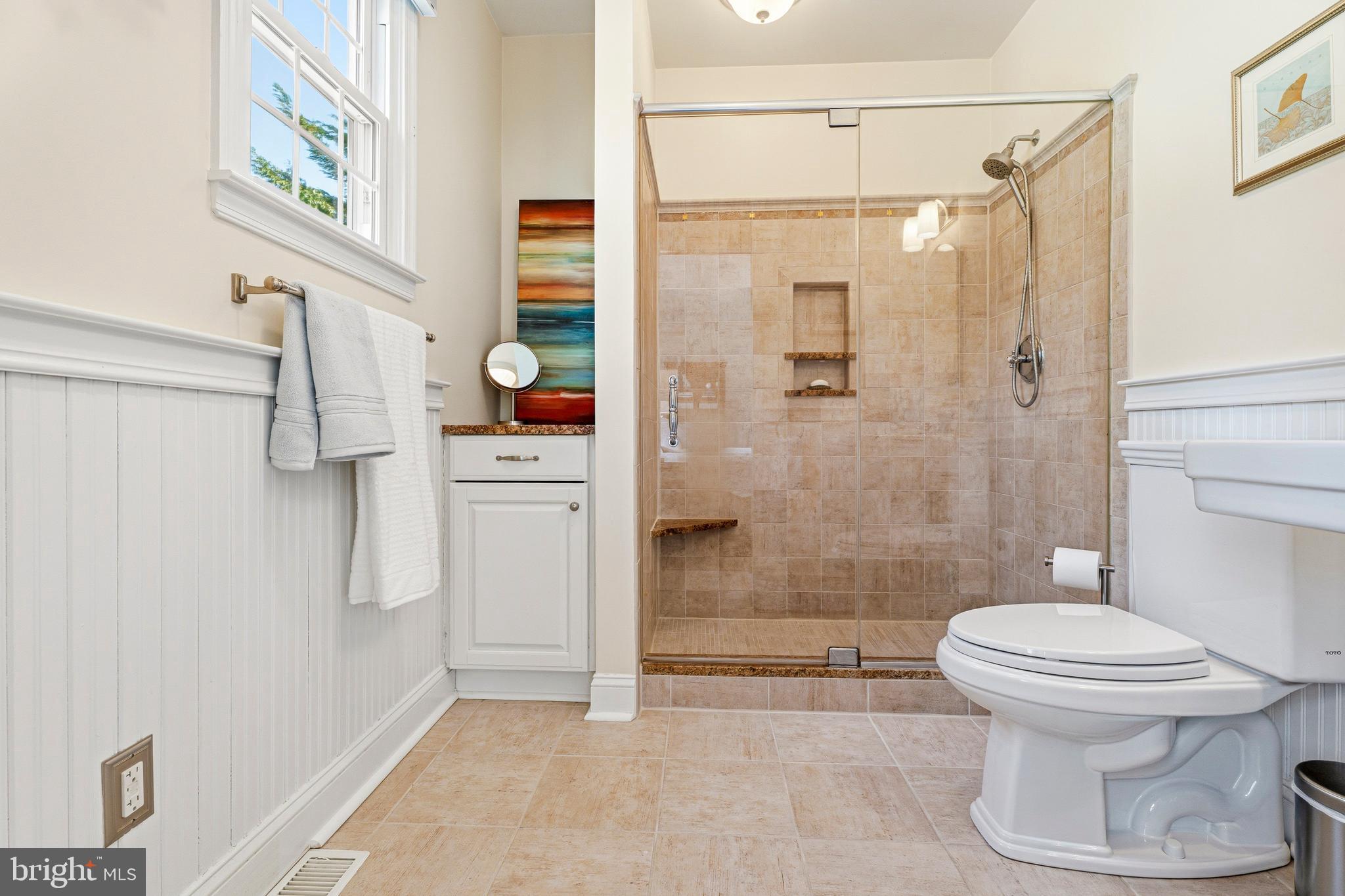 318 Alabama Road Towson, MD 21204 - Photo 37 of 72 a bathroom with a shower and toilet