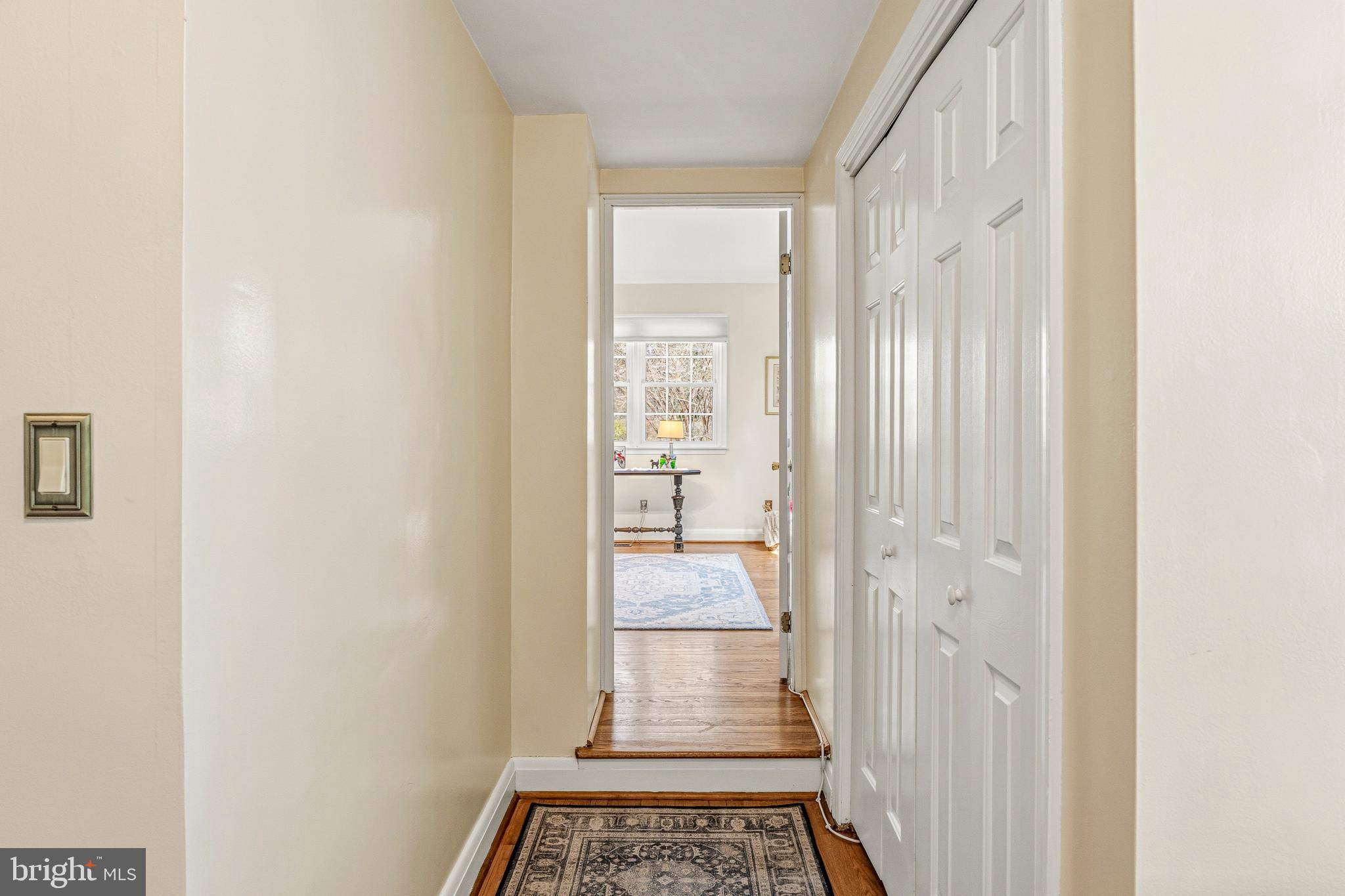 318 Alabama Road Towson, MD 21204 - Photo 42 of 72 a view of a hallway with wooden floor and a bathroom