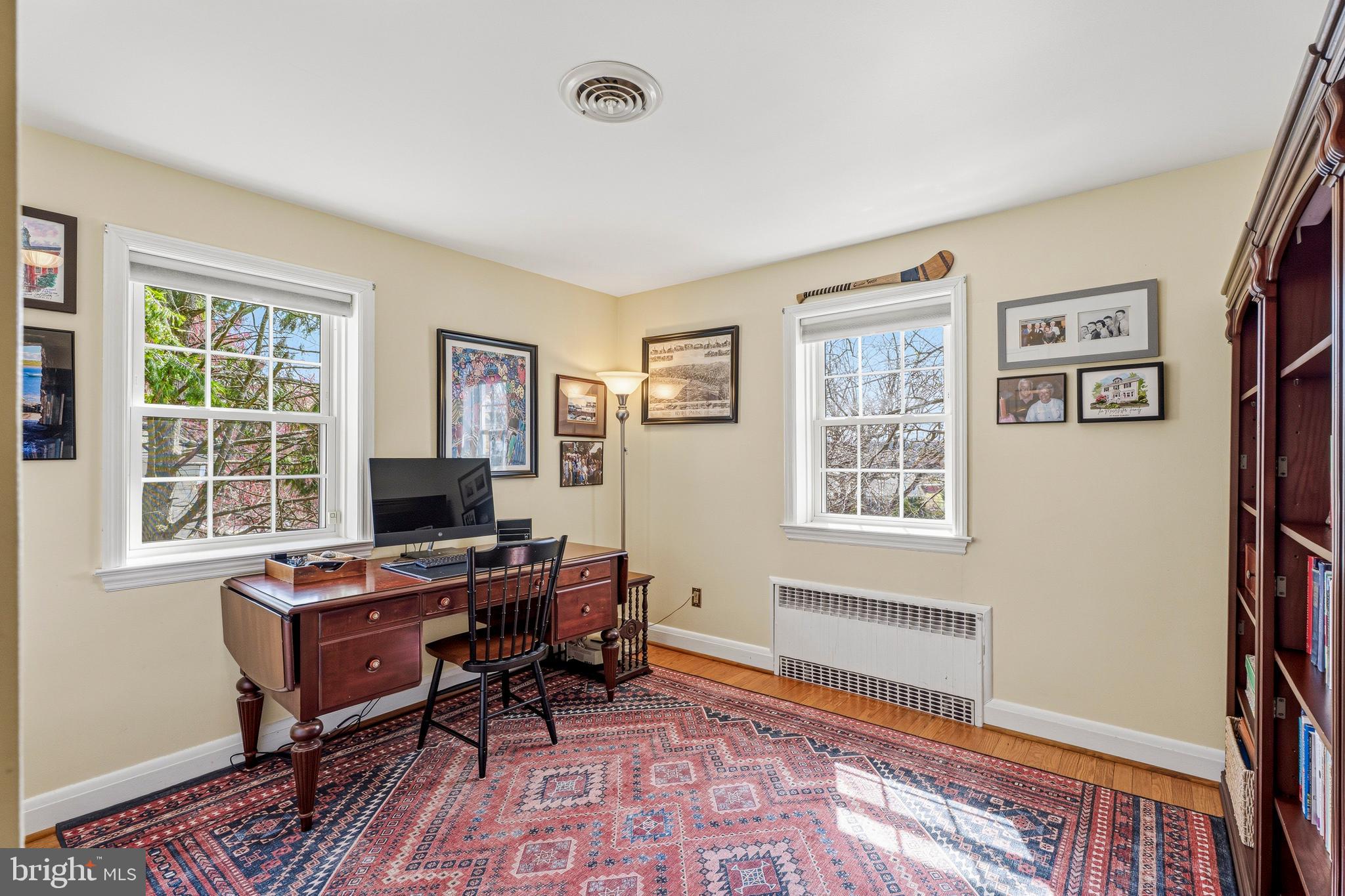318 Alabama Road Towson, MD 21204 - Photo 46 of 72 a view of a workspace with furniture and a window