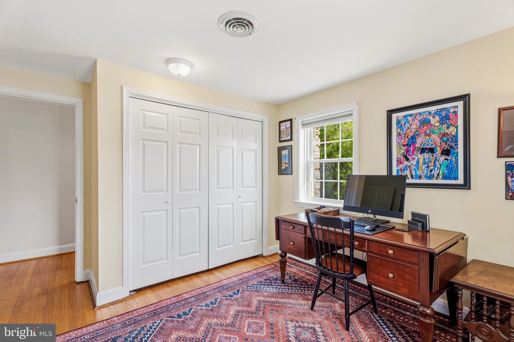 318 Alabama Road Towson, MD 21204 - Photo 47 of 72 a view of a workspace with furniture and a window