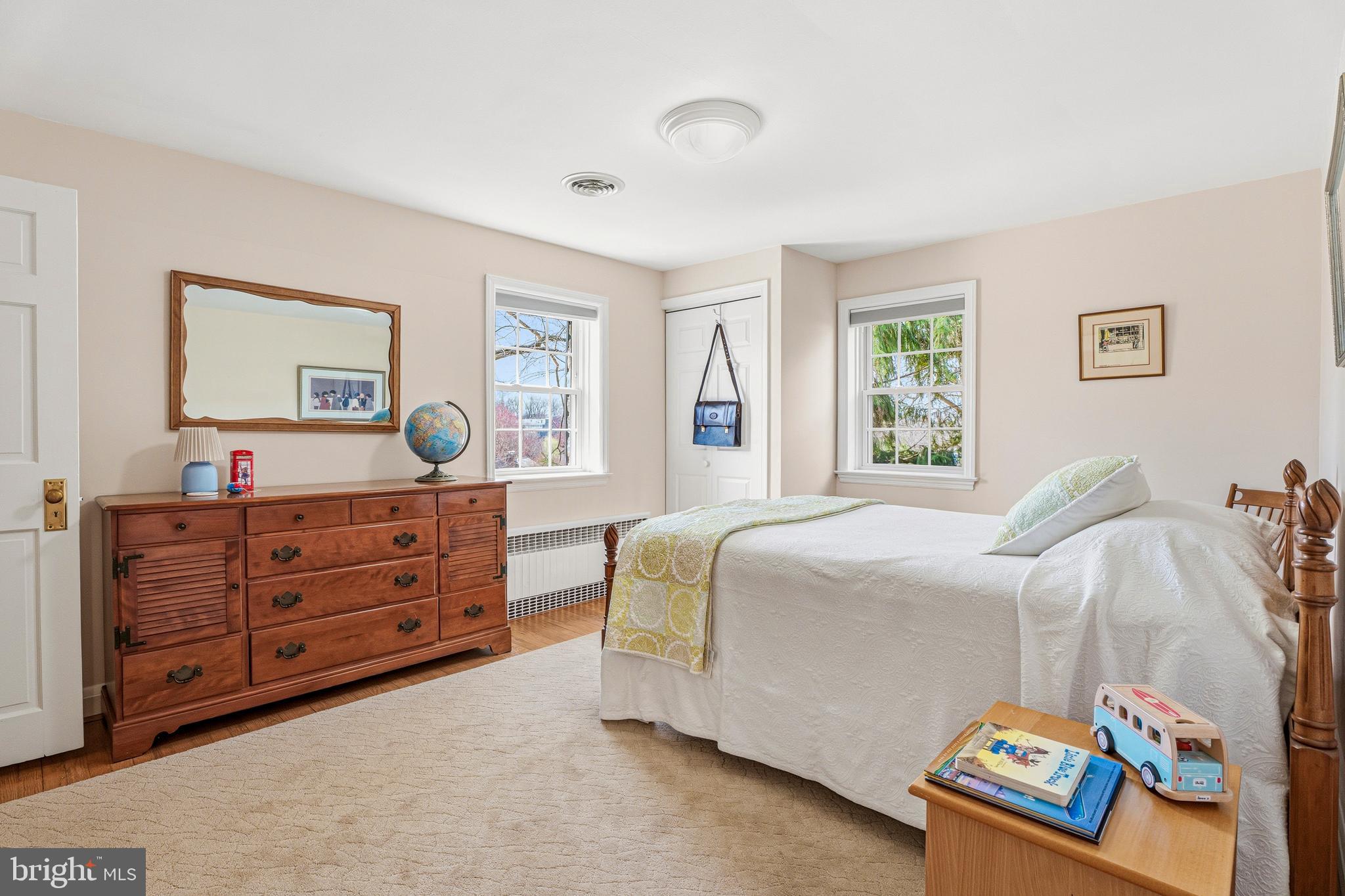318 Alabama Road Towson, MD 21204 - Photo 48 of 72 a bedroom with a bed and a dresser in it